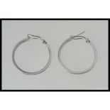 A pair of white metal 925 silver and cz hoop earrings 7.