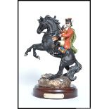A Royal Doulton limited edition 935 /5000 ceramic figure of Dick Turpin HN 3272 on turned wooden