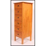 A tall good quality large pine upright pedestal chest of drawers.