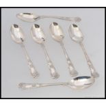 A set of 6 silver hallmarked spoons having embellished scrolled bowls and handles.
