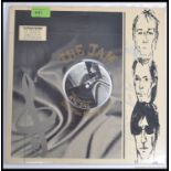 The Jam / Paul Weller - The Jam ' Dig The New Breed ' long play vinyl record being signed by the