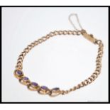 A 9ct gold curb link chain bracelet,