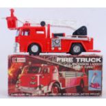 CLIFFORD TOYS: A vintage Clifford Toys Fire Truck battery operated plastic toy.