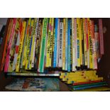 ANNUALS: A good assortment of vintage children's TV / Film related annuals to include The Wombles,