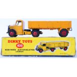 DINKY: An original vintage Dinky Toys boxed diecast model 409 Bedford Articulated Lorry, in yellow.