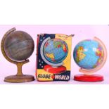 GLOBES: Two vintage tinplate children's globes.