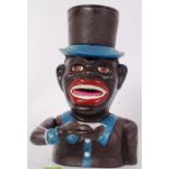 MONEY BOX: A vintage style reproduction hand painted cast iron moneybox, with moving features.
