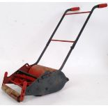 WEBB CHILDS LAWNMOWER: A charming vintage tinplate and metal childs Webb manual lawnmower.