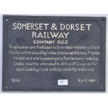 RAILWAY SIGN: A reproduction wall hanging cast iron Somerset & Dorset railway sign,