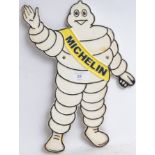 MICHELIN MAN: A vintage style cast iron Michelin Man advertising sign, in the shape of Bibendum,