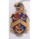 A rare 18ct gold and enamel set pendant medal adorned with the light infantry coat of arms with