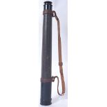 A vintage military style Busch telescope ( 20x magnification) with original leather strap.