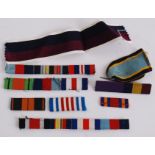A collection of campaign ribbons dating from WWII along with some campaign medal ribbons,
