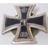 A German Nazi WWI Iron Cross, 1st Class. Complete with screwing back plate. Dated 1914 to cross.