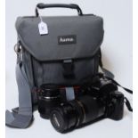 An original Canon EOS 1000F N SLR 35mm camera, complete with 2x lenses - 75-300mm and 35-80mm.