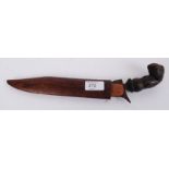 A 19th century Polynesian small Kriss -sword / dagger Within a hardwood scabbard  having a double