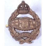 An original WWII Second World War Royal Armoured Corps cap badge by A Stanley & Sons Walsall.