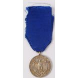 A WWII Second World War era Weirmacht ' Four Years Service ' medal.