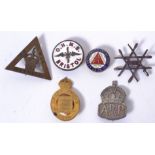 A collection of military cap badges to include ' On Her Majestys Service Bristol enamel set badge
