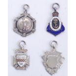 SILVER MEDALS: A collection of 4x hallmarked silver Second World War WWII era fob medals.