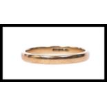 A 9ct gold wedding band ring marked for