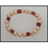 A contemporary pearl bracelet strung wit