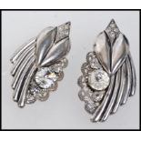 A pair of 1930s white metal dress clips