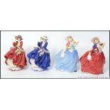 A group of 4 Royal Doulton figures to include Autumn Breeze HN1934 and Autumn Breeze HN3736 Michael