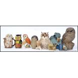 A collection of ceramic Owls to include examples Beswick, Poole,