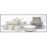 A retro 1970's Denby - Langley pottery dinner service comprising plates tureens etc