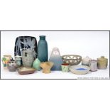 A collection of studio pottery to include several pieces such as vases,