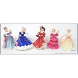 A group of 5 Royal Doulton figures of the year to include 1991 Amy HN3316 , 1992 Mary HN3375 ,