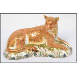 A Royal Crown Derby paperweight Lioness limited to 950 pieces with gold stopper.