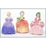 Three small Royal Doulton figures to include Marie HN 1370, Bo Peep HN 1811 and Cissie HN 1809.