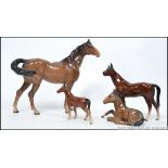 A collection of Beswick horse figurines