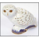 A Royal Crown Derby paperweight Snowy Ow