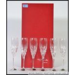 A set of ' Cristal ' crystal champagne flutes. Within the original lined presentation box.