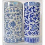 A large Chinese blue and white floor vase / umbrella stand together with another similar ( see