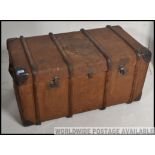 A good quality large early 20th century wooden and canvas bound steamer trunk.