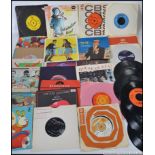 A collection of 45rpm vinyl 7" singles to include The Kinks, Frank Sinatra, Madness,