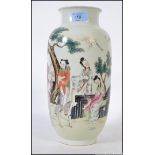 A Chinese large famille rose vase with unusual court scenes of people and storks / cranes.