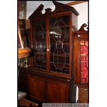 A 19th century Gerorgian library bookcase cabinet / cupboard.