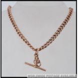 A 9ct gold vintage albert pocket watch chain with clasps at both ends being curb linked.