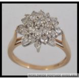 An 9ct gold and diamond ladies cluster ring approx 1.25pnts, total weight 4.2g Size P.