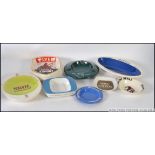 A collection of retro advertising ashtrays, to include Piper, Charles Kinloch, Martell, Fremlins,