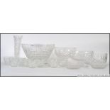 A collection of 20th century cut glass & Crystal decanters to include various shapes and sizes all