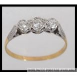 An 18ct gold and platinum vintage ladies diamond ring.