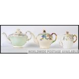 A collection of three teapots to include ones by Aynsley in the Poppy pattern,