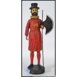 Composite Beefeater statue.