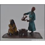 A cold painted Austrian style bronze of two Arabs having coffee W13cm